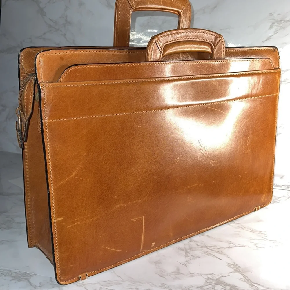 Hey JR Wants This Awesome Leather Briefcase! Very Smart with Slide Down Handels